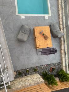 an overhead view of a table with two umbrellas at Villa Maria in Stalos