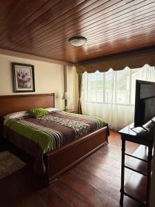 Postel nebo postele na pokoji v ubytování House Loft Loja