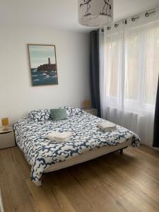 Ένα ή περισσότερα κρεβάτια σε δωμάτιο στο Villa Les Hortensias