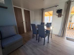 Et opholdsområde på Mobil-Home tout confort au Cap Ferret