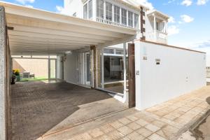 an open patio with a white house at Serenity Villa Lanzarote by Beyond in San Bartolomé