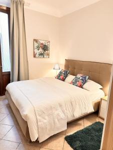 Ένα ή περισσότερα κρεβάτια σε δωμάτιο στο La Corte di Angelico