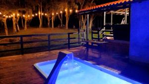 Bazén v ubytování Pousada Caminho do Lago nebo v jeho okolí