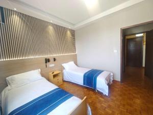 Postel nebo postele na pokoji v ubytování Hotel Ristorante Oro