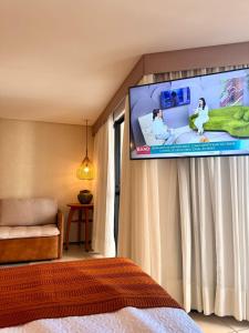 TV a/nebo společenská místnost v ubytování O melhor da Beira Mar de Fortaleza