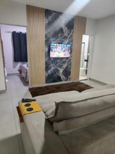 Et opholdsområde på cafofo aconchegante