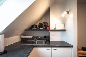 Η κουζίνα ή μικρή κουζίνα στο Deichkoje 5 Dagebüll