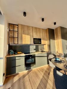 Kuchyň nebo kuchyňský kout v ubytování EASY RENT- Szeligowskiego 211 Chodźki Residence, 24h Check-in