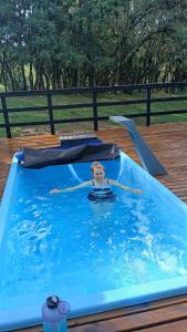 Bazén v ubytování Pousada Caminho do Lago nebo v jeho okolí