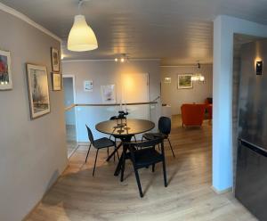 a dining room with a table and chairs at Two rooms apartment in Reykjavik in Reykjavík