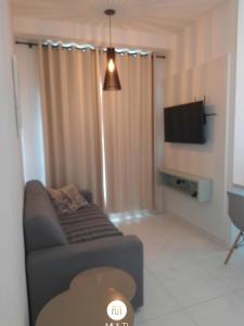 Телевизор и/или развлекательный центр в Apto Nantes com Vista pro Beto Carrero World