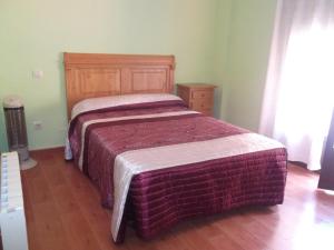A bed or beds in a room at Apartamento Prado