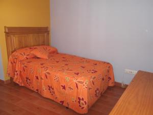 A bed or beds in a room at Apartamento Prado