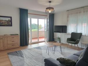 a living room with a couch and a table at Casa Playa Meira in Moaña