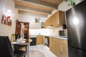 Η κουζίνα ή μικρή κουζίνα στο Südhöhe-Domizil