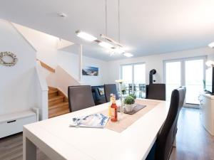 Posezení v ubytování Holiday apartment in Olpenitz with sauna