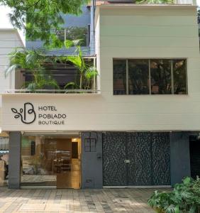 a hotel pokoda boulevard with a building at Hotel Poblado Boutique in Medellín