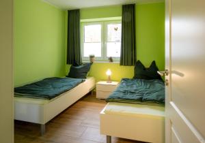 Ένα ή περισσότερα κρεβάτια σε δωμάτιο στο Dachsbau