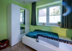 Ένα ή περισσότερα κρεβάτια σε δωμάτιο στο Fuchsbau