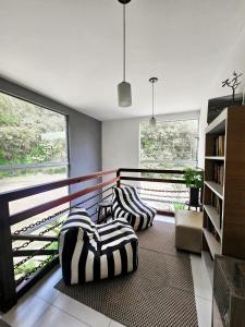 Posezení v ubytování Foresthouse Beach Hostel