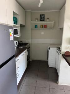 Kuchyň nebo kuchyňský kout v ubytování Luminoso estudio para 3 personas en Ovalle