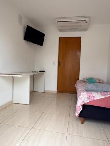 TV/trung tâm giải trí tại Quarto Ágape