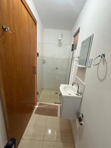 Phòng tắm tại Quarto Ágape