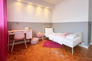 Ένα ή περισσότερα κρεβάτια σε δωμάτιο στο Appartement chaleureux - 4 personnes