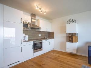 Köök või kööginurk majutusasutuses Holiday apartment in Olpenitz with balcony