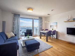 Televiisor ja/või meelelahutuskeskus majutusasutuses Holiday apartment in Olpenitz with balcony