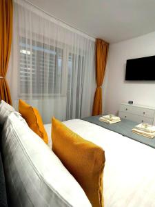 Postel nebo postele na pokoji v ubytování Apartament MARIO + 3 fotografie