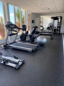 a gym with several treadmills and exercise machines at Indigo Escape in Koolbaai