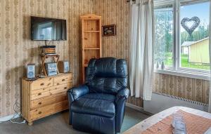 TV a/nebo společenská místnost v ubytování Mården