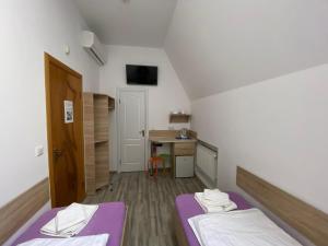 Ένα ή περισσότερα κρεβάτια σε δωμάτιο στο Hamster 007 Secret Hotel