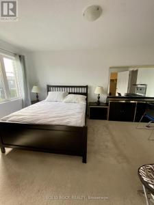 Postel nebo postele na pokoji v ubytování Cozy Prime Home + 2 fotografie