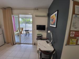 TV a/nebo společenská místnost v ubytování GITE VENITIA T2