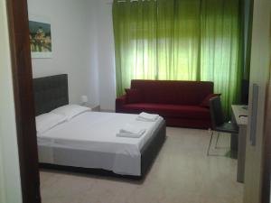 Posteľ alebo postele v izbe v ubytovaní Olimpica Relais guest house