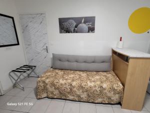 Postel nebo postele na pokoji v ubytování GITE VENITIA T2