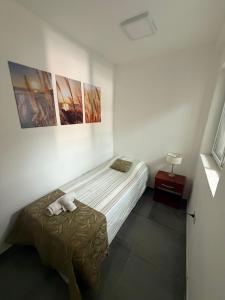 Postel nebo postele na pokoji v ubytování Dpto CORRIENTES, Planta BAJA + 14 fotografií