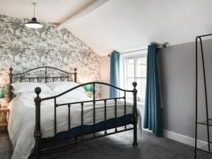 En eller flere senge i et værelse på Rose Croft