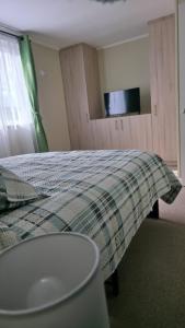 TV a/nebo společenská místnost v ubytování Refugio tranquilo en Bosquemar