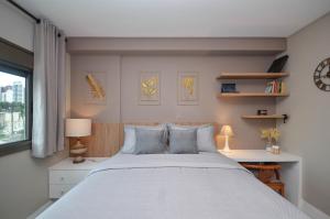 Giường trong phòng chung tại Home Batel +36 ảnh