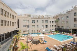 an image of a swimming pool in a hotel at Playa Sardina Home with Pool in Sardina