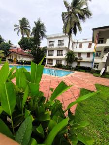 Bazén v ubytování Bliss by the Pool Goa nebo v jeho okolí