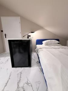 Postel nebo postele na pokoji v ubytování STRYH21 by APT21