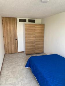 Ένα ή περισσότερα κρεβάτια σε δωμάτιο στο Apartamento 202 frente a UPTC