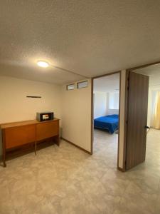 Ένα ή περισσότερα κρεβάτια σε δωμάτιο στο Apartamento 202 frente a UPTC