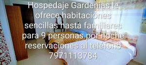 a poster of a bedroom with a bed at Hospedaje alcatraz in Chignahuapan