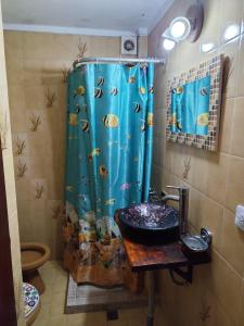 Et badeværelse på Edificio Maracuja - Departamentos + 37 billeder