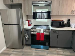 Kuchyň nebo kuchyňský kout v ubytování Executive Suite